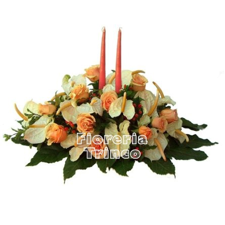 Foto Composizione centrotavola con fiori e candele